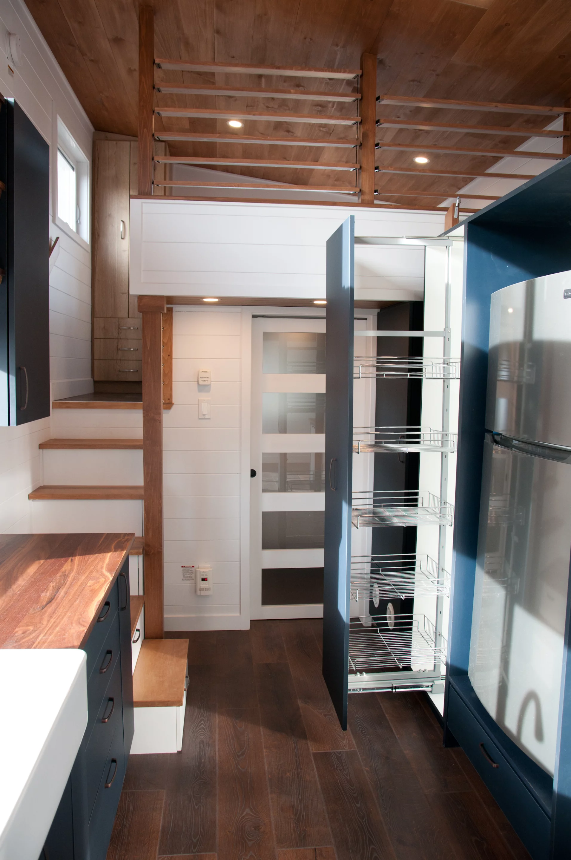 The Charme V2's kitchen has a large pull-out pantry