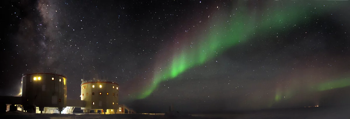 The Aurora Australis lights up the sky over Concordia