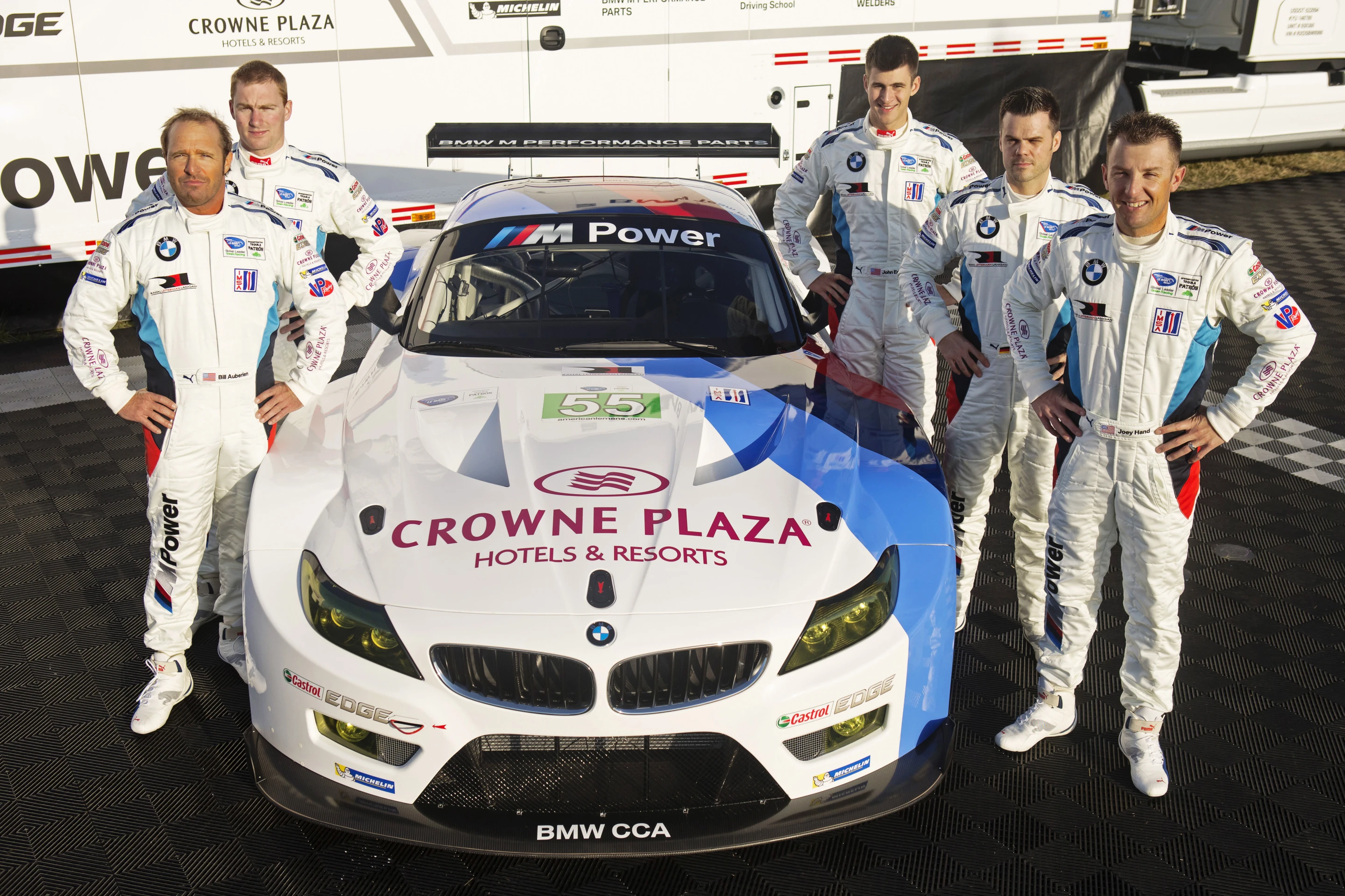 BMW's race team poses with their new car