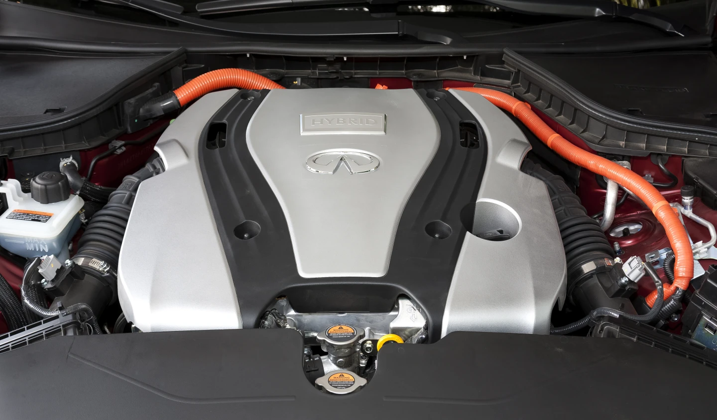 The Q50's naturally aspirated model uses a 3.7 liter V6 capable of delivering 328 hp and 269 lb. ft of torque while the hybrid model delivers a combined power rating of 360 hp