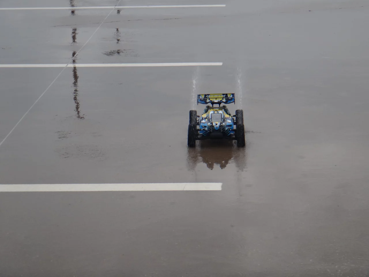 At full speed, the front tires will visibly lift off the ground a tad with each little bump in the road