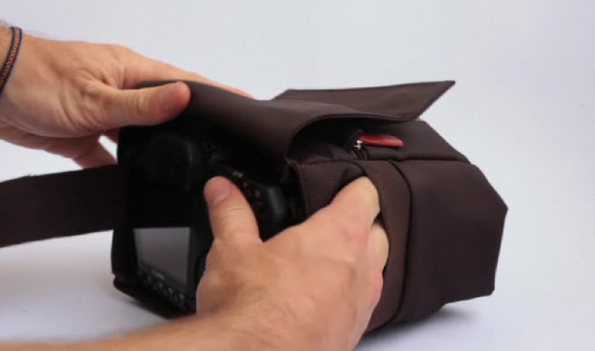 The top flap can be opened to give you access to the camera’s various functions
