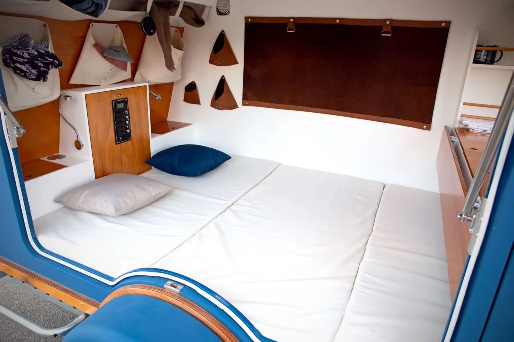 The mattresses slide together to create a bed