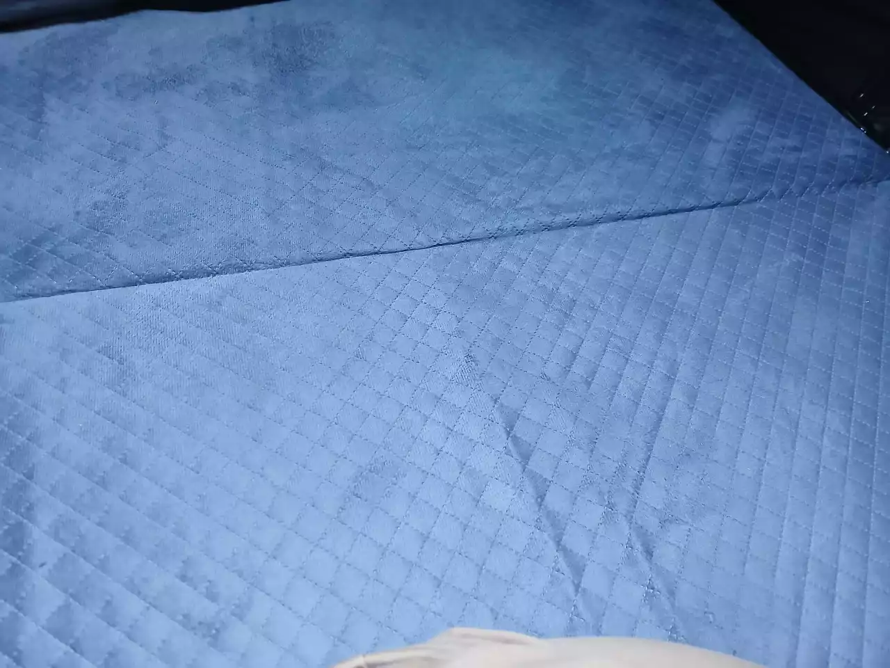 The mattress features nice soft top fabric but is too thin and hard for real comfort