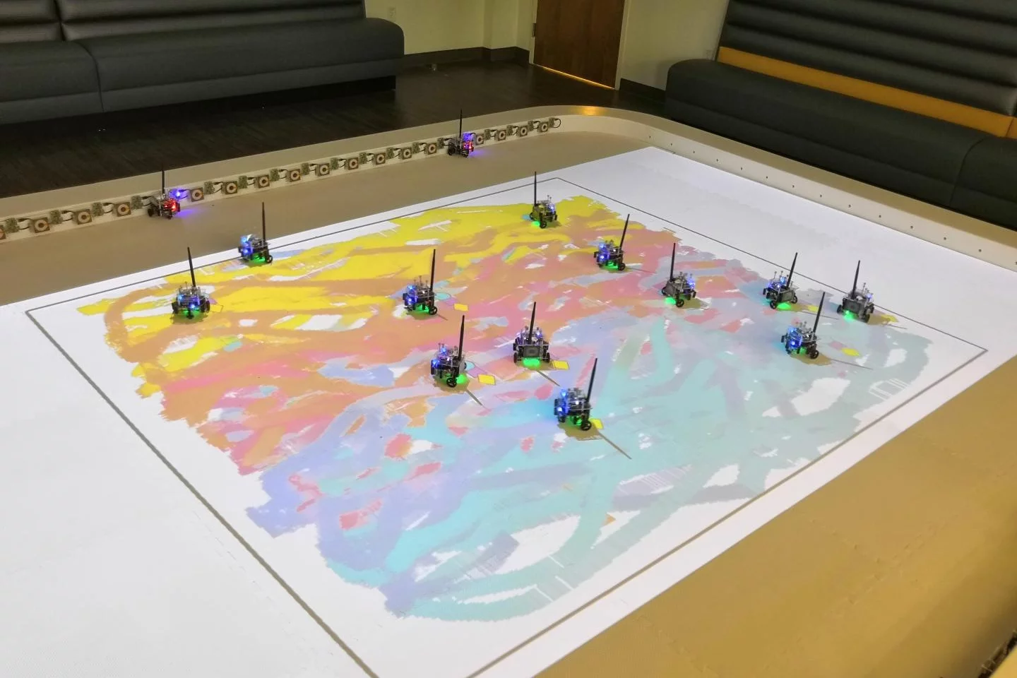 The "painting" robots in action – although they're currently limited to creating fairly abstract works, they should be able to produce more refined images once the technology is developed further