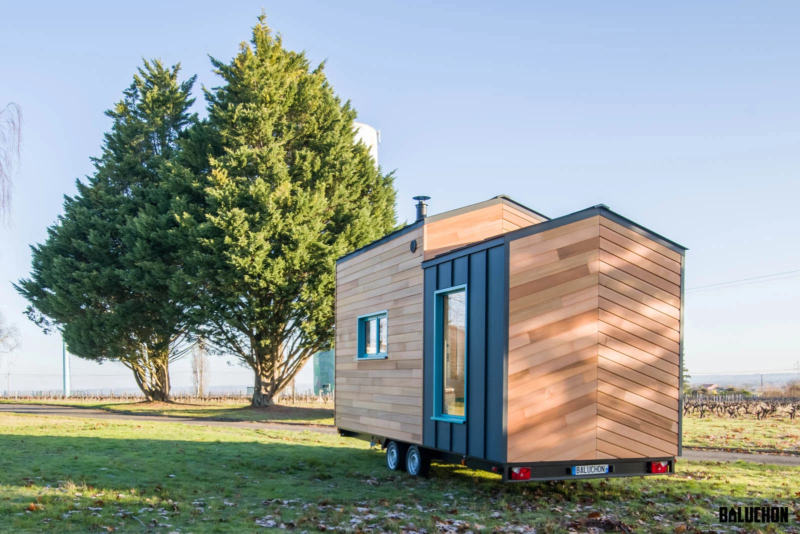 La Maison du Bonheur is based on a double-axle trailer and is finished in cedar