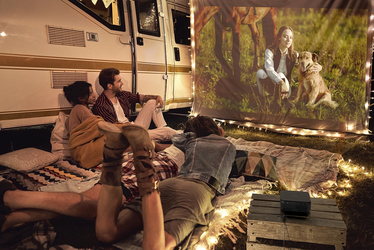 A Lifestudio Pop projector providing 4K or 1080p entertainment in the yard, though you will need to factor in mains power