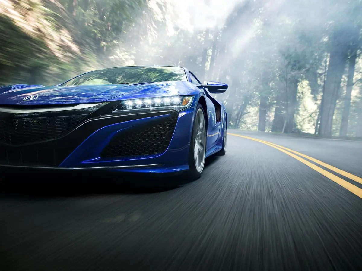 The battery pack in the 2017 NSX is located below the center console to optimize weight distribution, lowering the center of gravity for the car