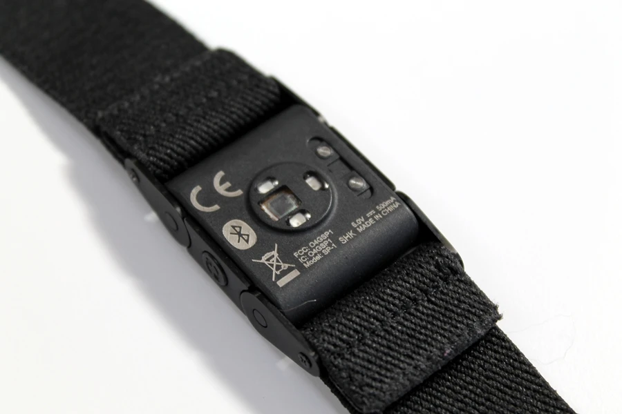 The rear of the PulseOn shows the optical sensor and contacts for charging the device