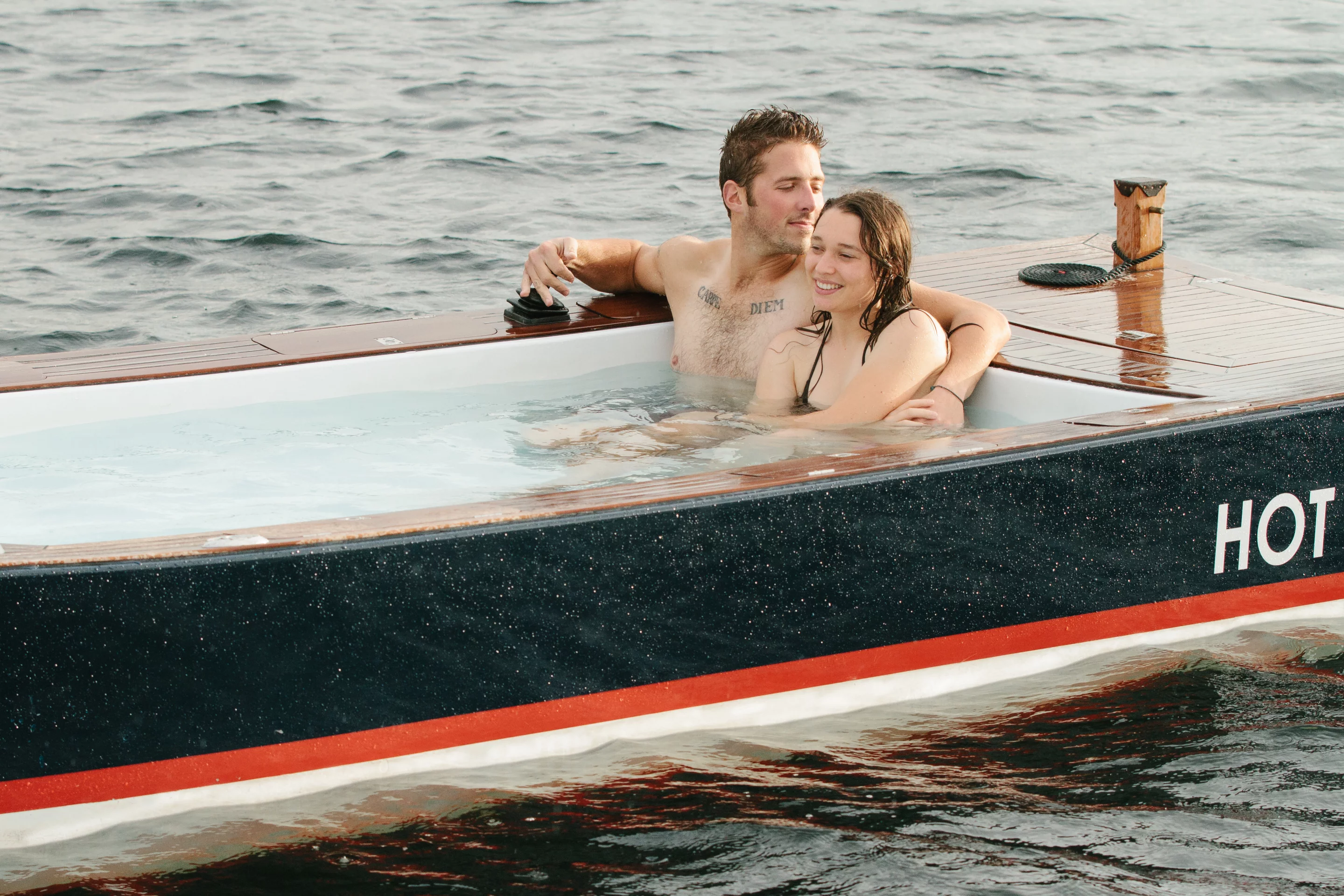 The Hot Tub Boat allows its passengers to soak while they cruise