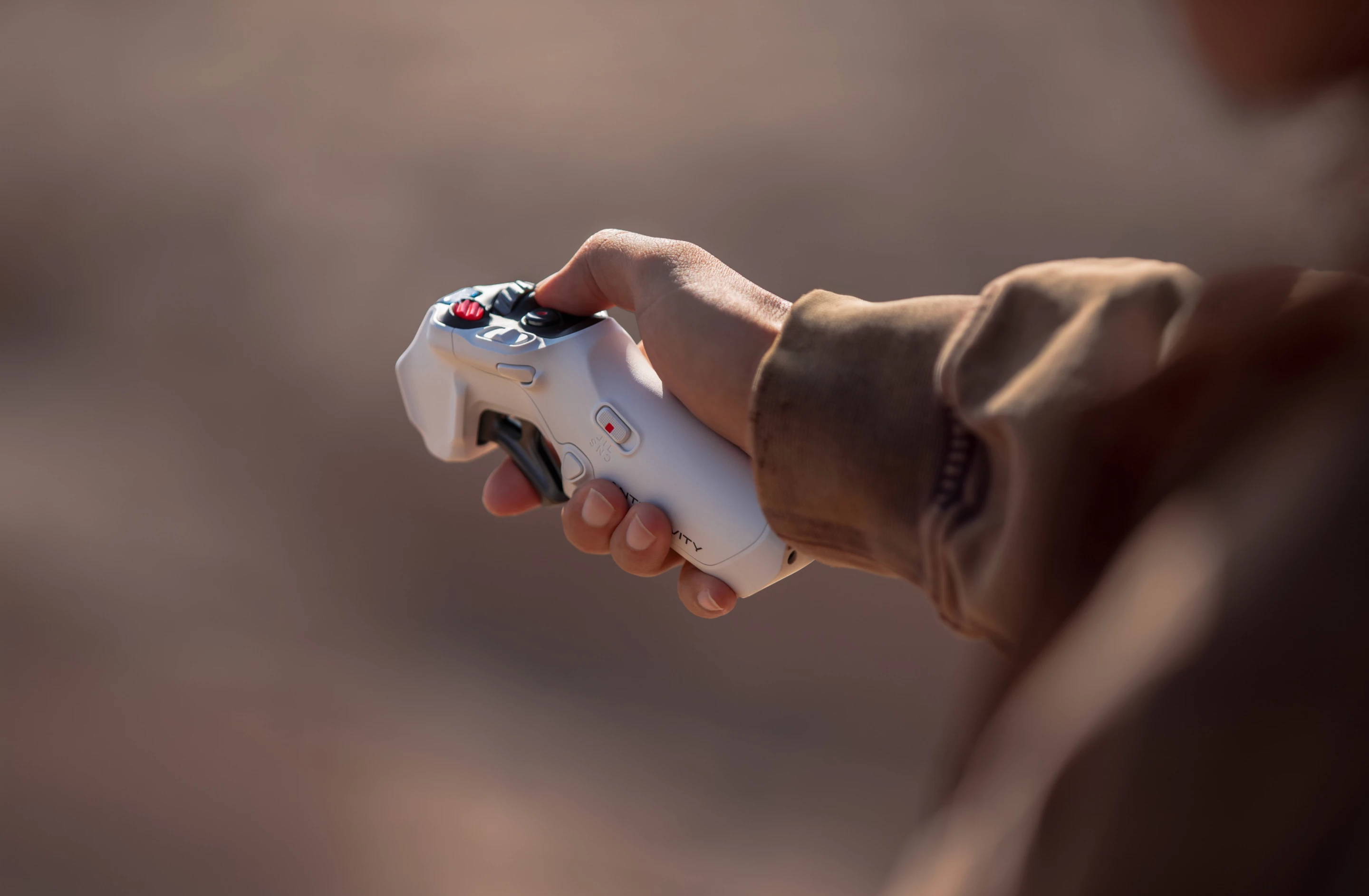 Pilots control the Antigravity A1 using a handheld trigger remote with point-to-fly ease of use
