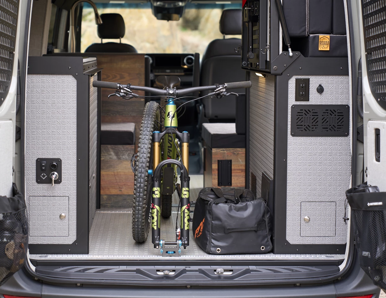 The foldaway rear bed lends to the more open floor plan and makes room for gear