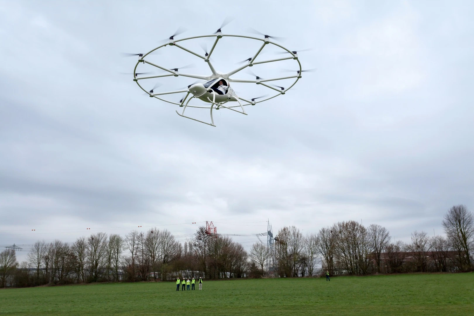 Built from fiber composite material with a 450 kg (992 lb) take-off weight, nine individual batteries power the all-electric motors and 18 rotors to make for a top speed of 100 km/h (62 mph)