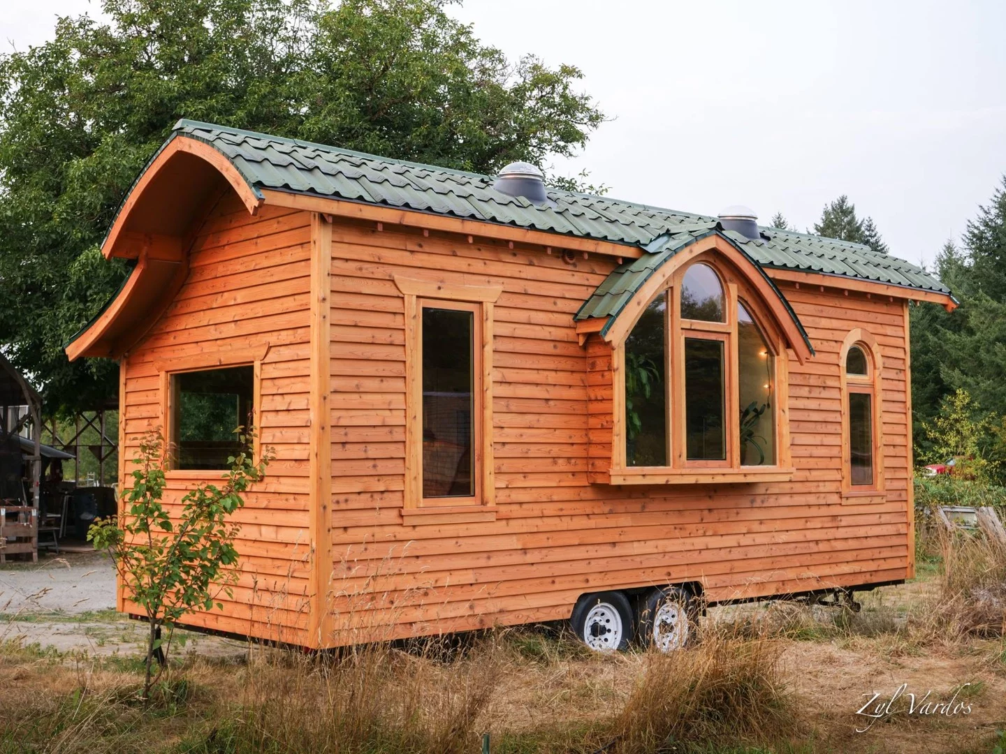 An Onduvilla-tiled roof and its 13 handmade window frames help give the Damselfly House a unique identity