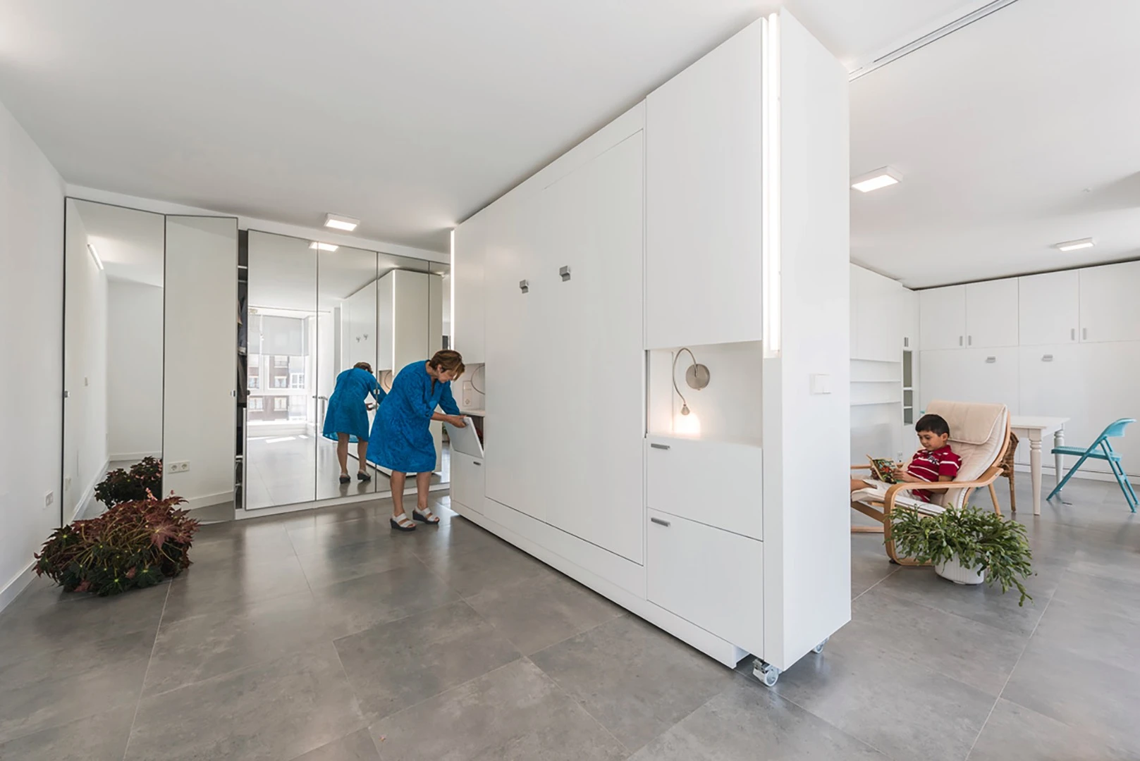 If there's just a couple of people home, the apartment can be be arranged into one studio with a large living space