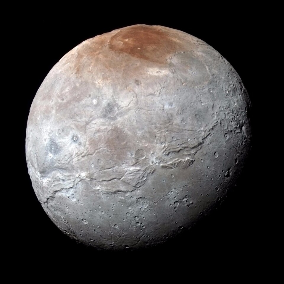 Image of Pluto's moon Charon, taken by New Horizons. This new high-resolution image taken by the spacecraft's Ralph/Multispectral Visual Imaging Camera (MVIC) contains geological features down to a scale of 1.8 miles (2.9 km)