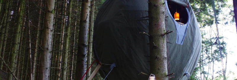 The interior of the Tree Tent can include a water storage tank and pump, underfloor battery pack, and a bio-fuel stove