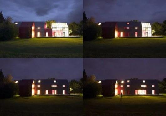 Sliding house showing different facades at night.