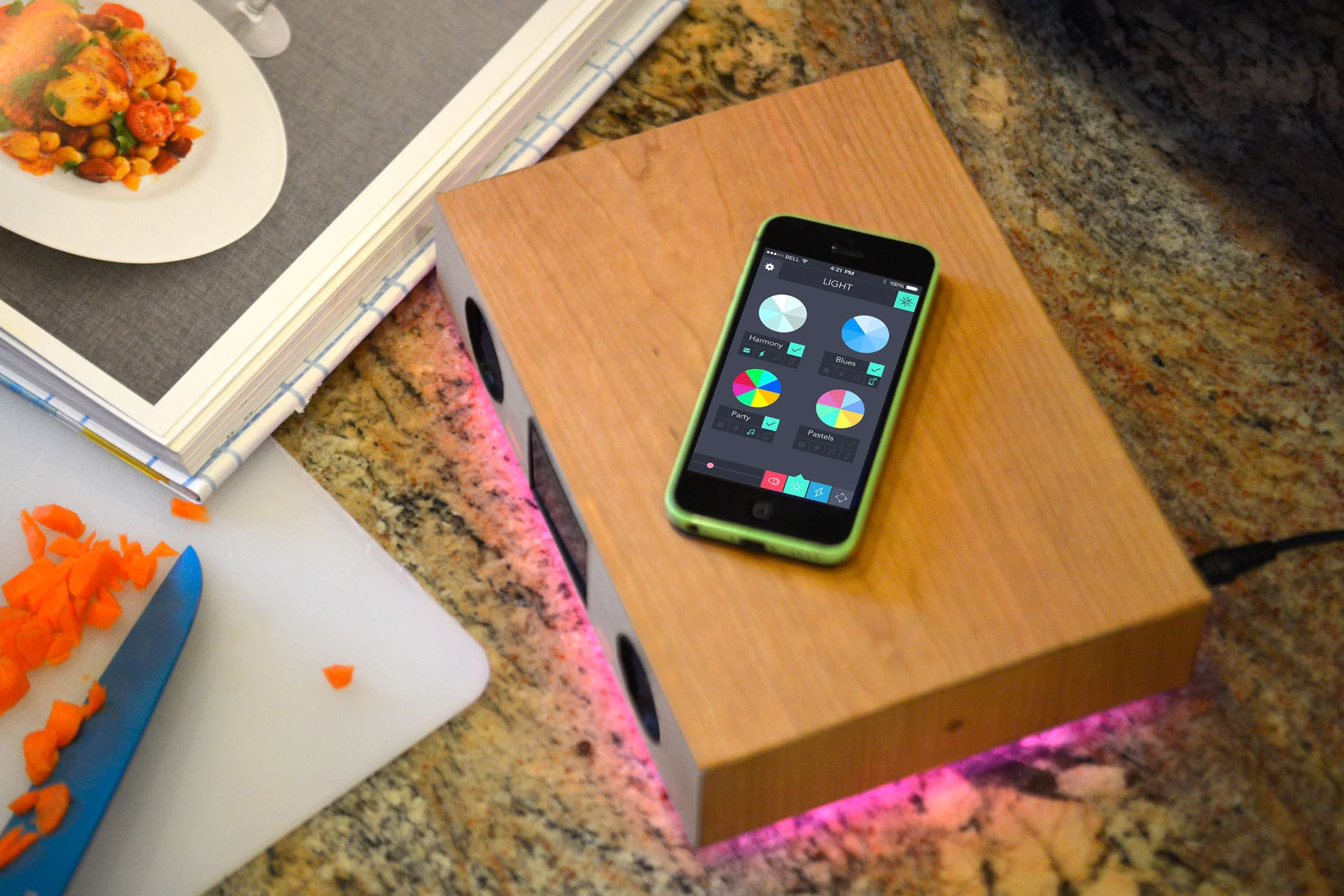 The center third of Glowdeck's upper surface acts as a charging platform for Qi-compatible smartphones, or devices wrapped in Qi-enabled charging cases