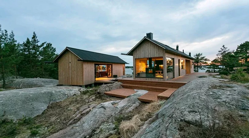Wooden decking allows the buildings to sit amid rocky landscape