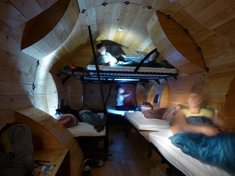 Accommodating nine guests, the shelter is equipped with three double beds and three single beds