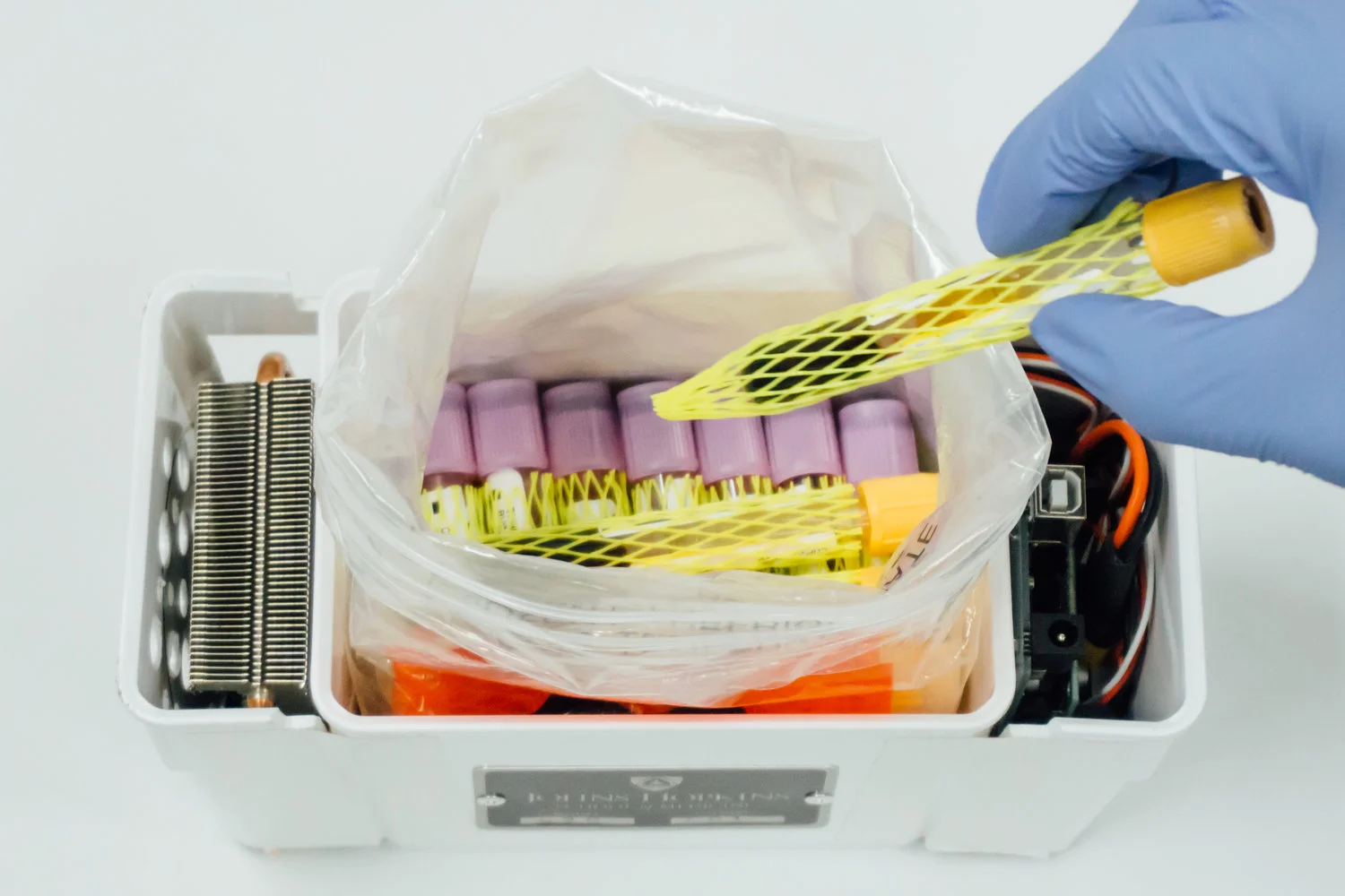 Samples are packed into the drone's temperature-controlled payload