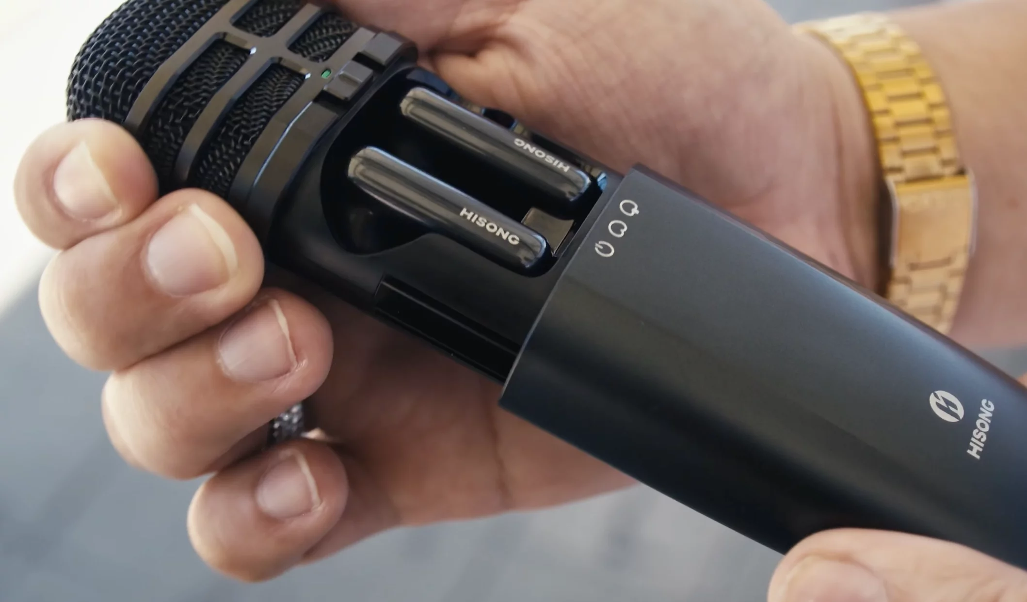 Compact wireless microphone that doubles as a charging bay for the system's wireless in-ear monitors