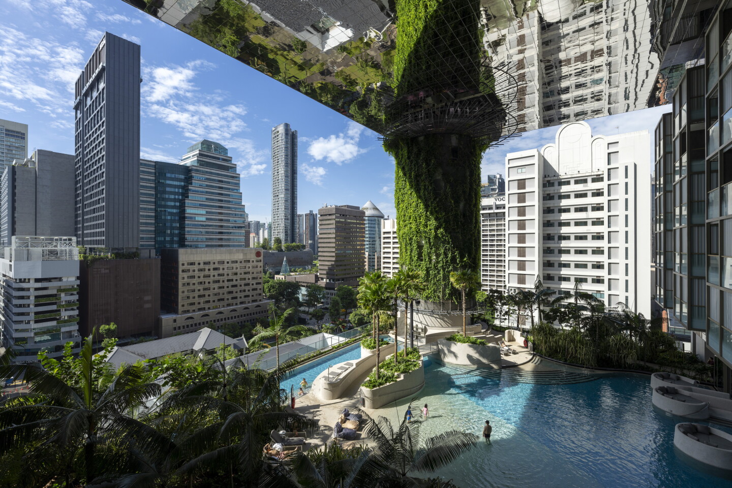 Pan Pacific Orchard features swimming pools and lush greenery, helping to cool the immediate area