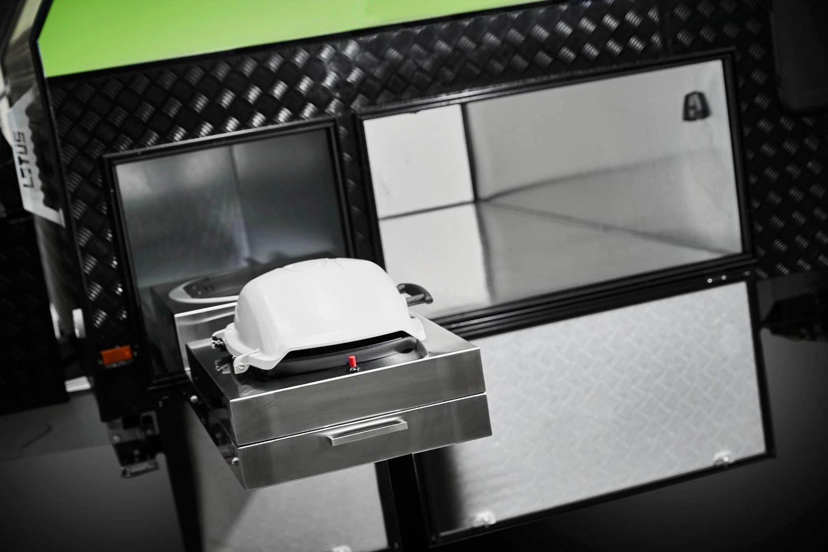The Off Grid outdoor kitchen includes a Weber grill