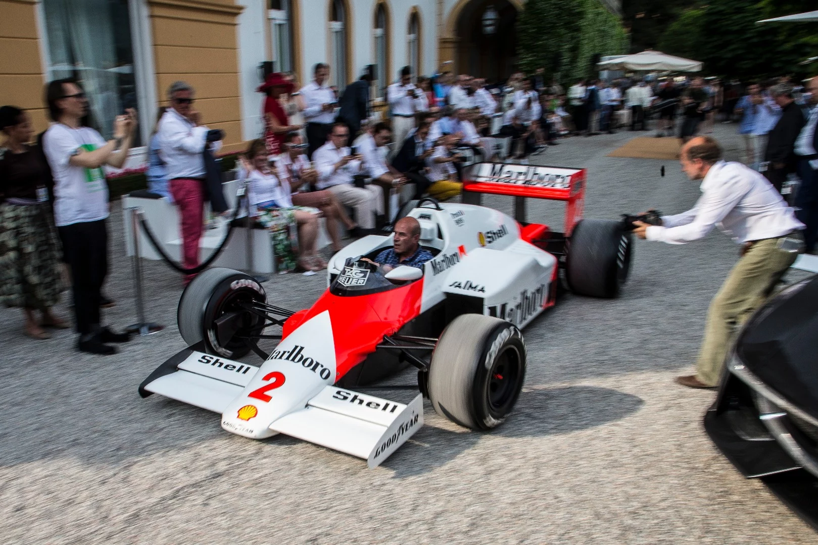 When Gerhard Berger competed in 1985 at the beginning of his career, he drove an Arrows-BMW, scoring just three points with a best result of fifth place. That season, the car he chased from distance was this 1985 McLaren driven by Niki Lauda and Alain Prost. Prost won the title and this MP4/2B (we don't know which one it was) crossed the line first seven times, for six wins and a disqualification after the race for being under the minimum weight. Berger obviously liked what he saw because he was the entrant of the car in Class H, aptly entitled: When Sex Was Safe And Racing Was Dangerous: Formula One!