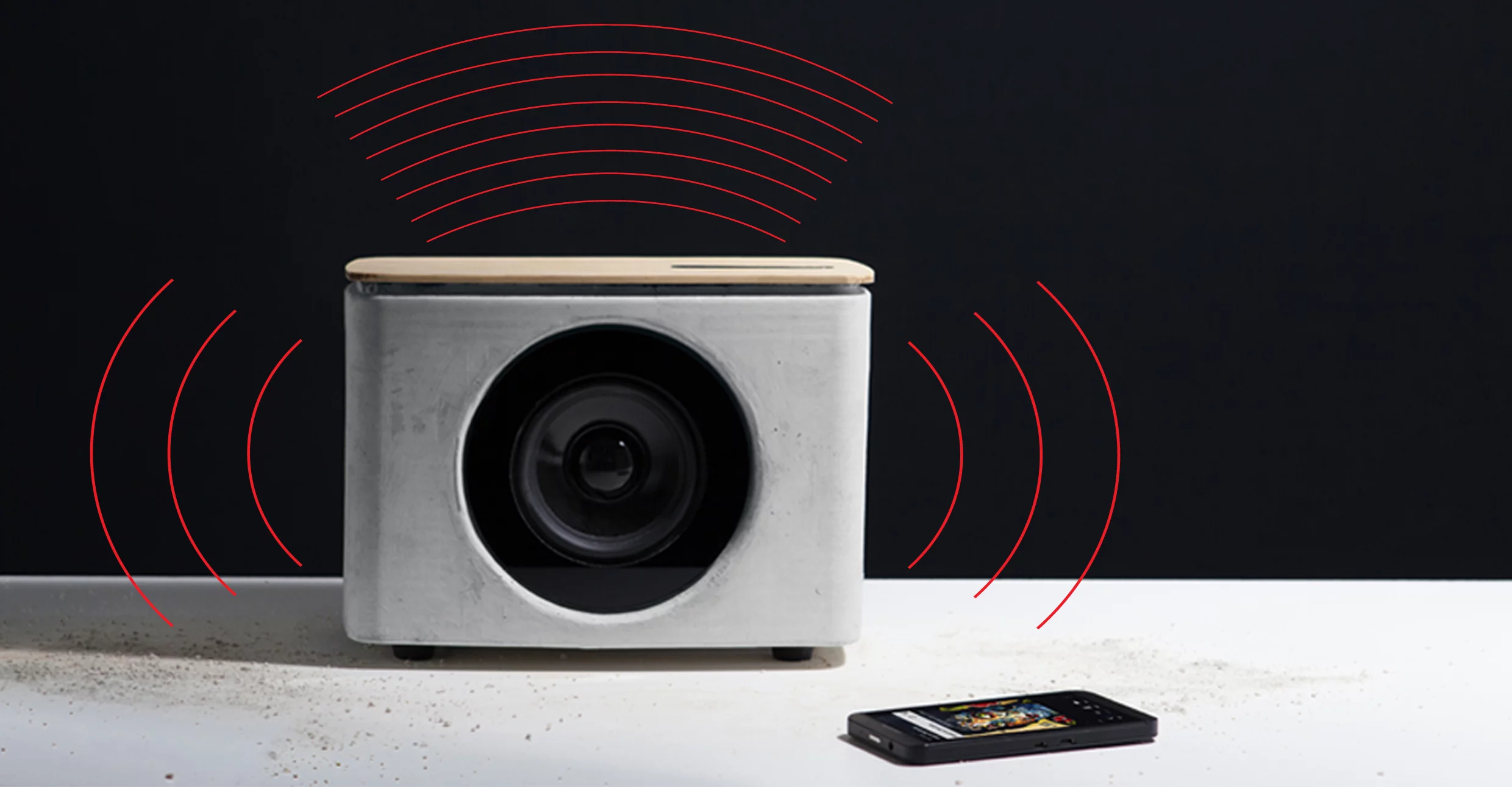 A 2-inch surface transducer mounted underneath the harmonic board adds warmth to the highs, while the concrete housing enhances bass performance