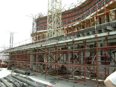 The concrete shell of Dubai's innovative O-14 office tower provides an efficient structure that frees the core from the burden of lateral forces and creates highly efficient, column-free open spaces in the buildings interior