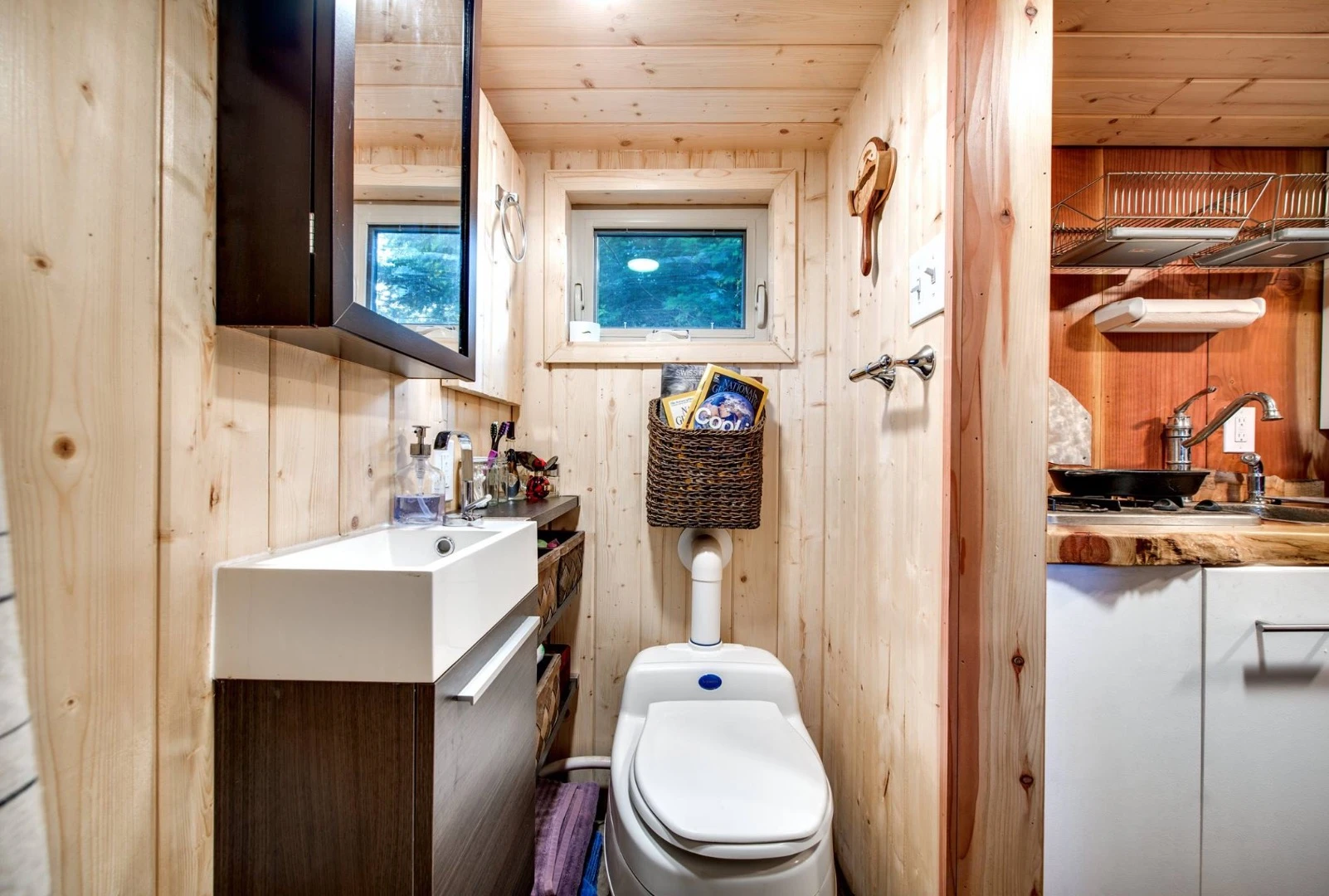 The bathroom includes a composting toilet