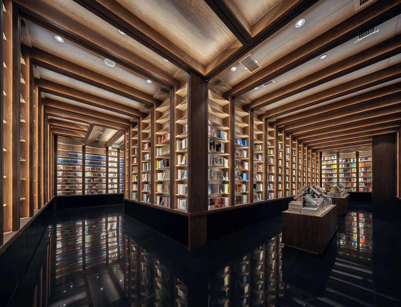 Tunnel with a reflective floor inside the Chongqing Zhongshuge Bookstore