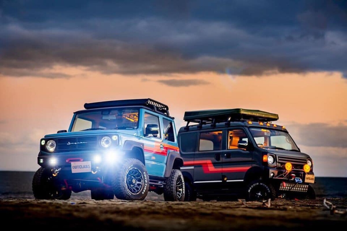 Outclass showed the Suzuki Every off-road camper van (right) alongside a retro-styled Jimny