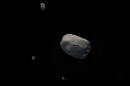 An artist's impression of Elektra, the quadruple asteroid system