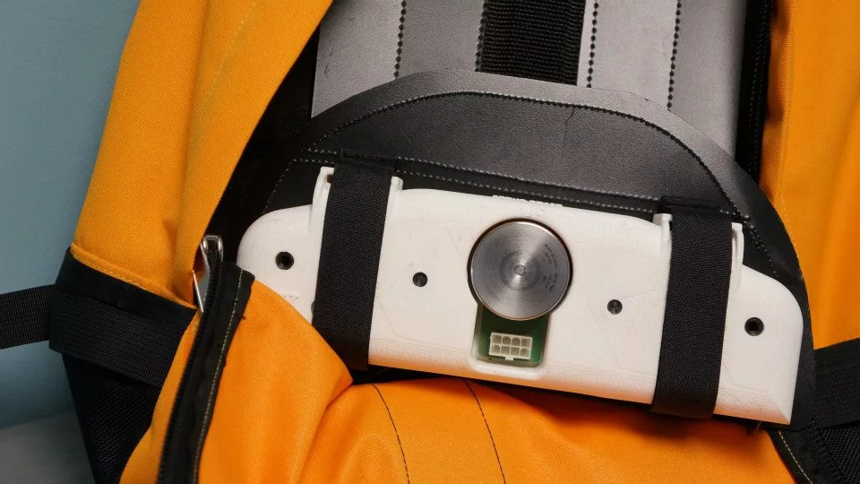 The Go Kin generator slides into the bottom of the backpack