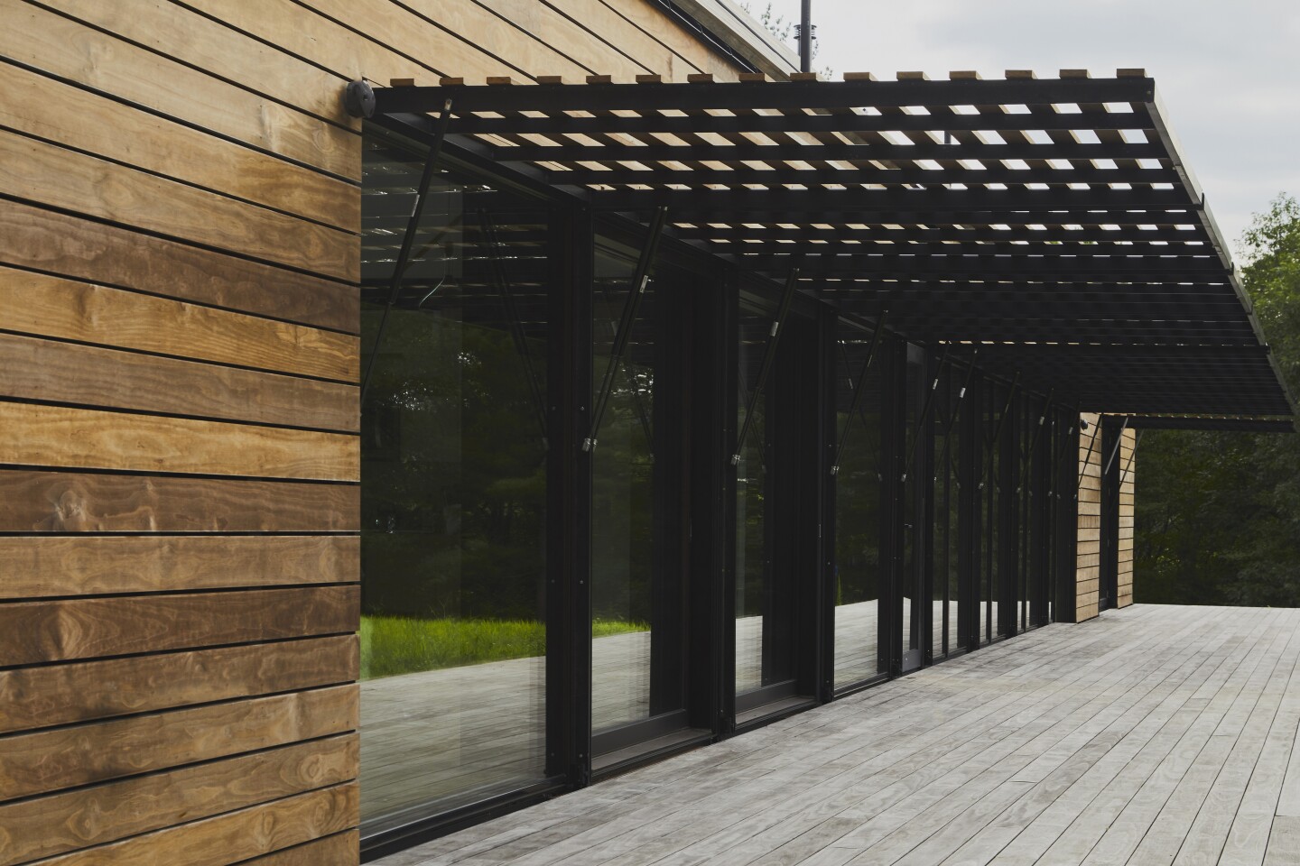 One impressive feature of the home is the clever shading system over its south-facing facade