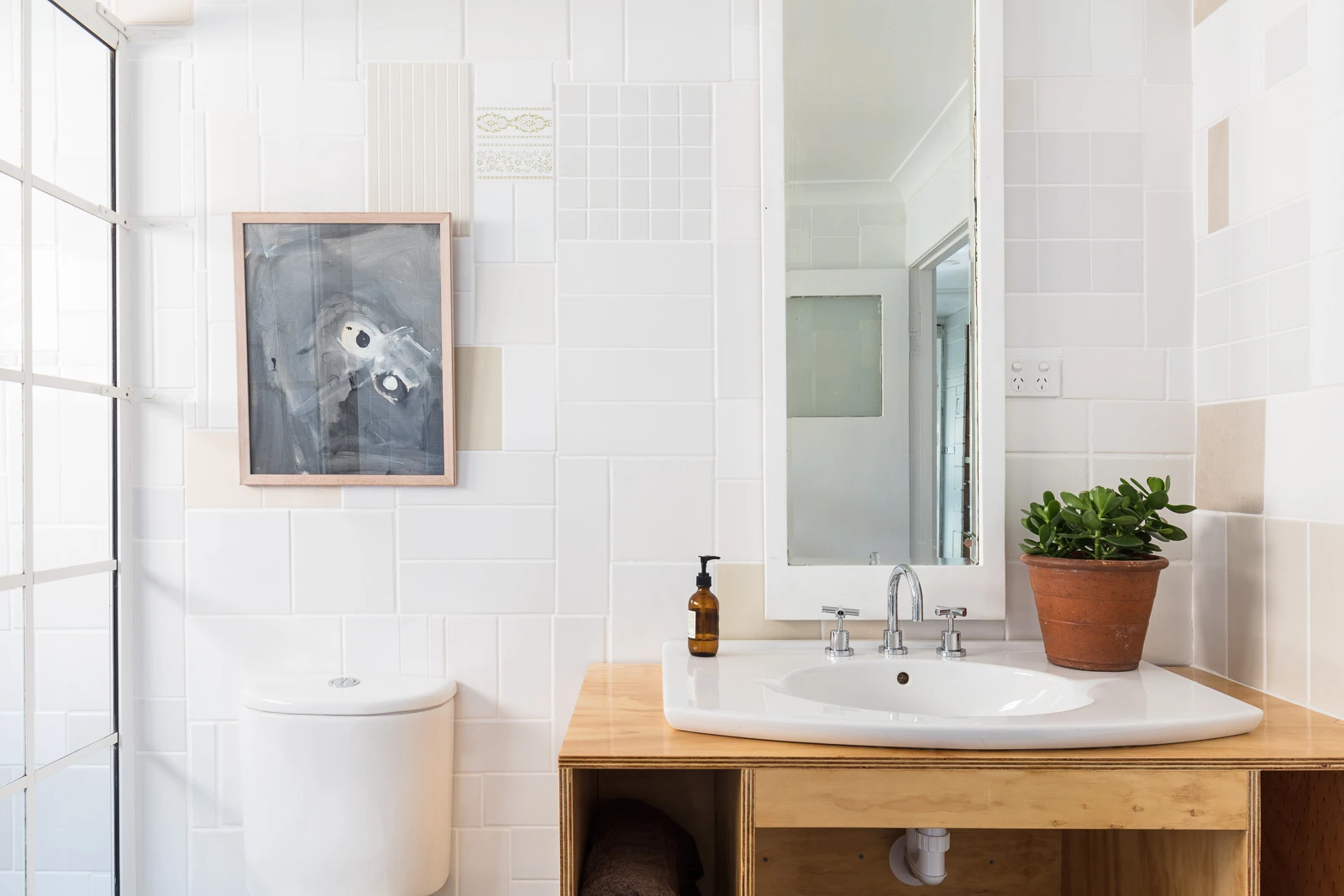 The Up-Cycle House's interior decor is very clean and light