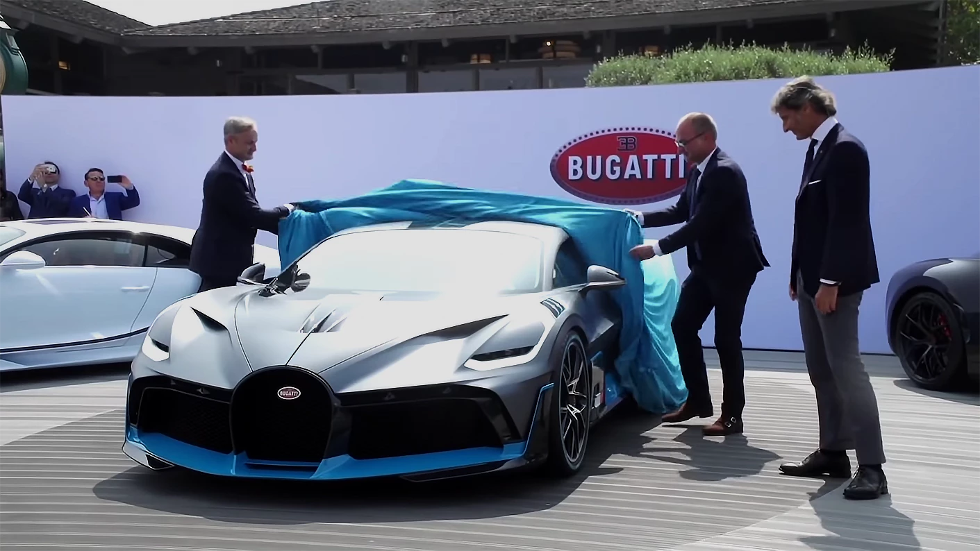 Bugatti's top brass pulls the covers off the Divo at the Quail in Monterey