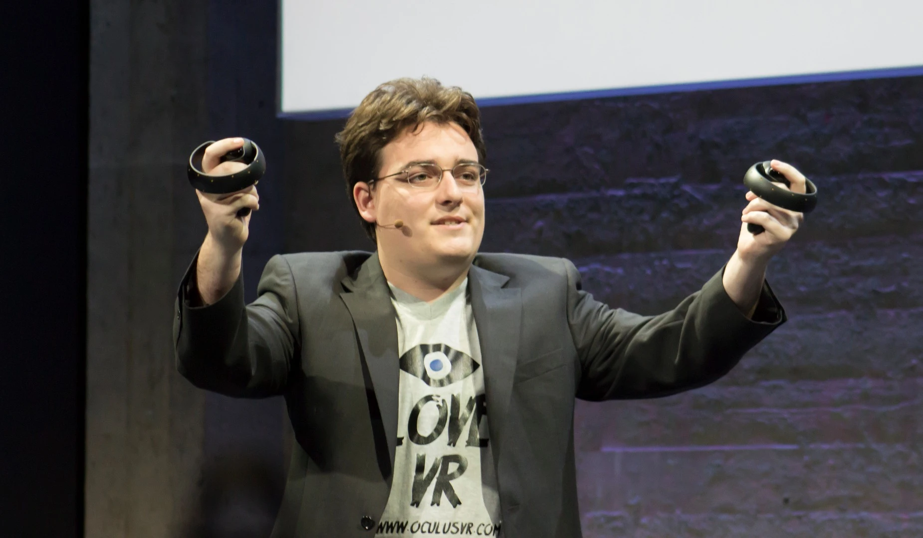Oculus founder Palmer Luckey, showing off the Oculus Touch controllers at the company's June 2015 launch event