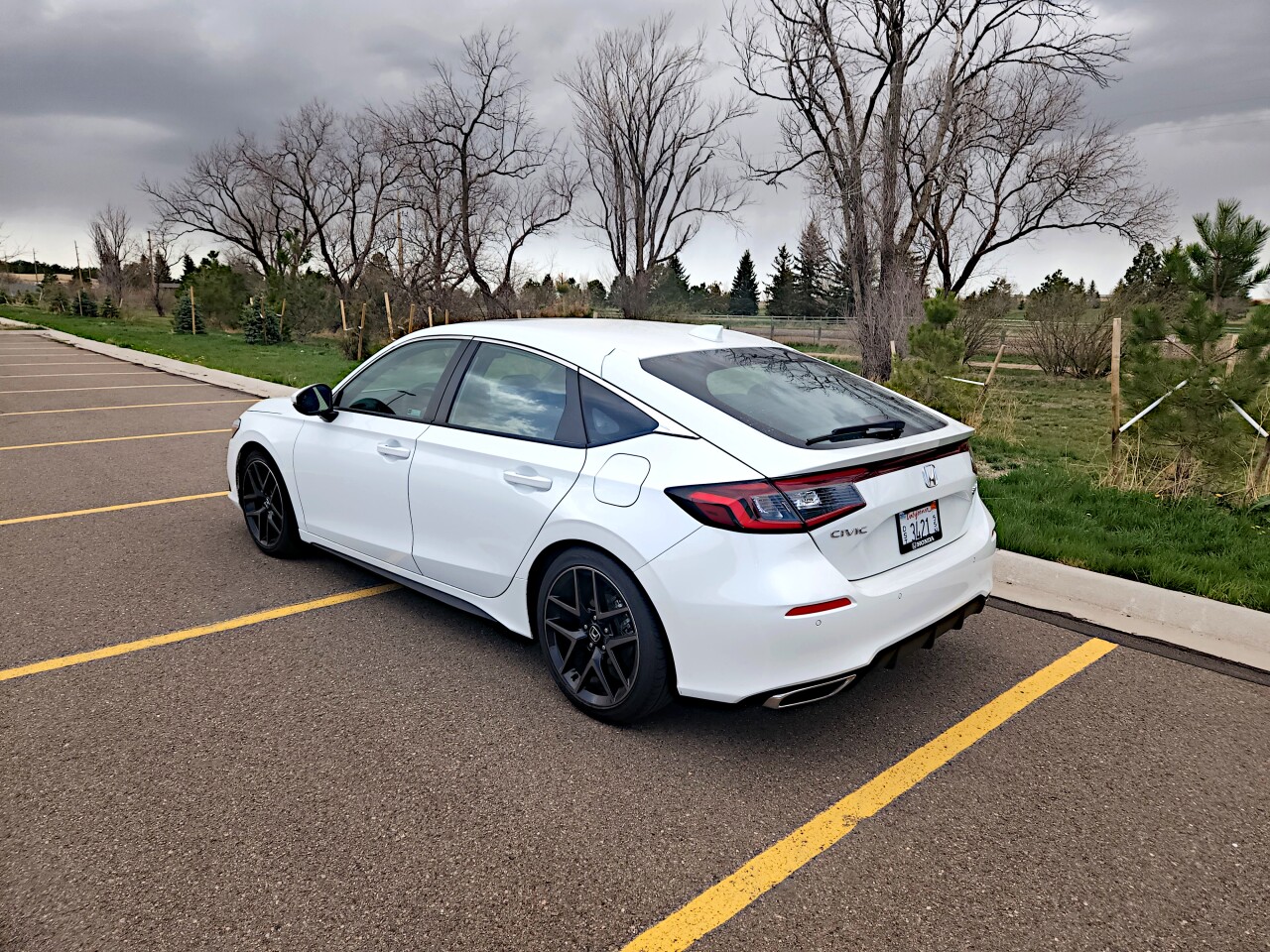 Body-wise, the hatchback has a longer roofline and more beef at the rear versus the more clipped fastback styling on the sedan