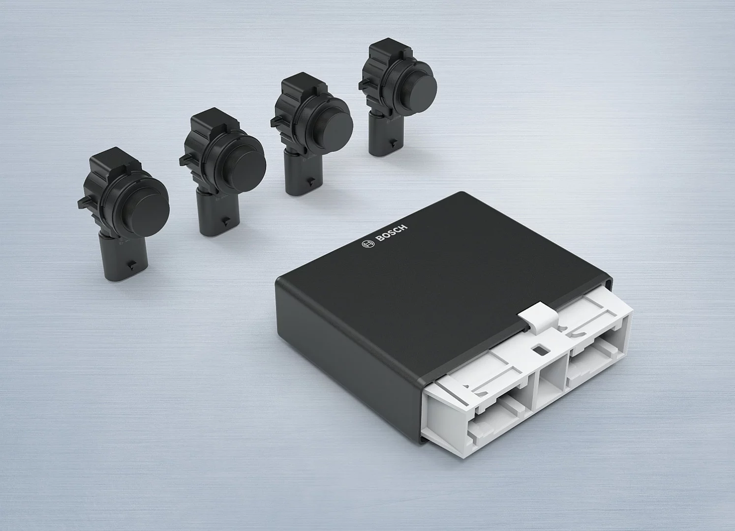 The control unit of the Bosch Side View Assist system receives data from four ultrasonic sensors and compiles them to identify vehicles coming from behind that may be in the rider's blind spots