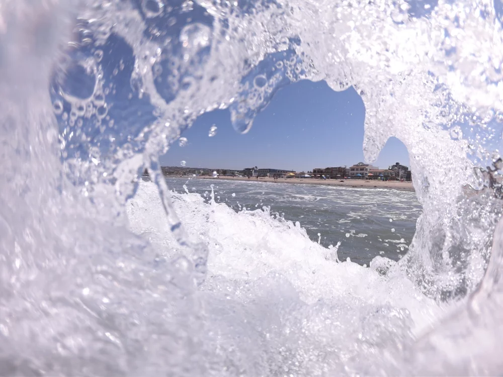 Nominee, Amateur, Seascape. A coastal shot through the middle of a barrel