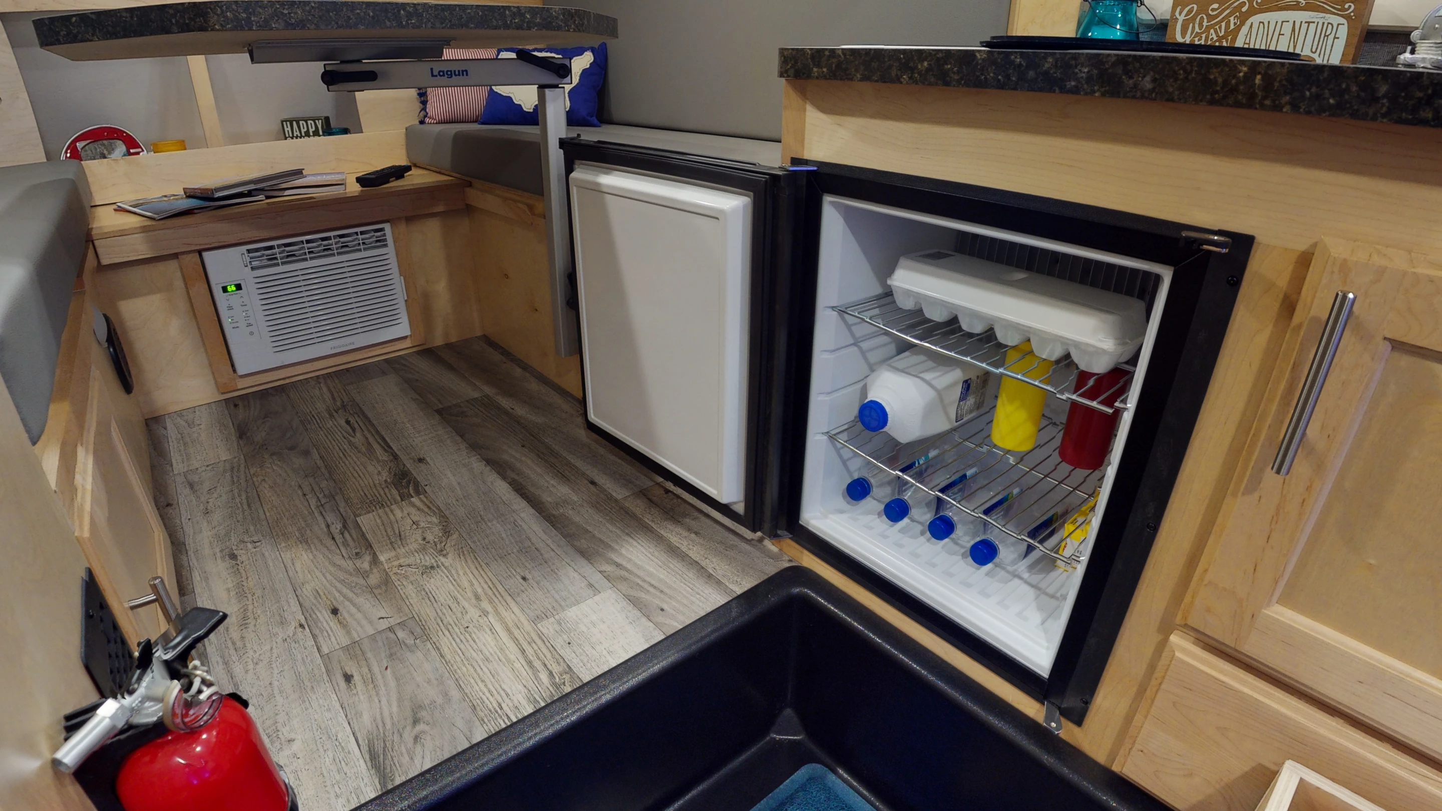 Popping the 14-L fridge open on the Little Guy Micro Max teardrop trailer