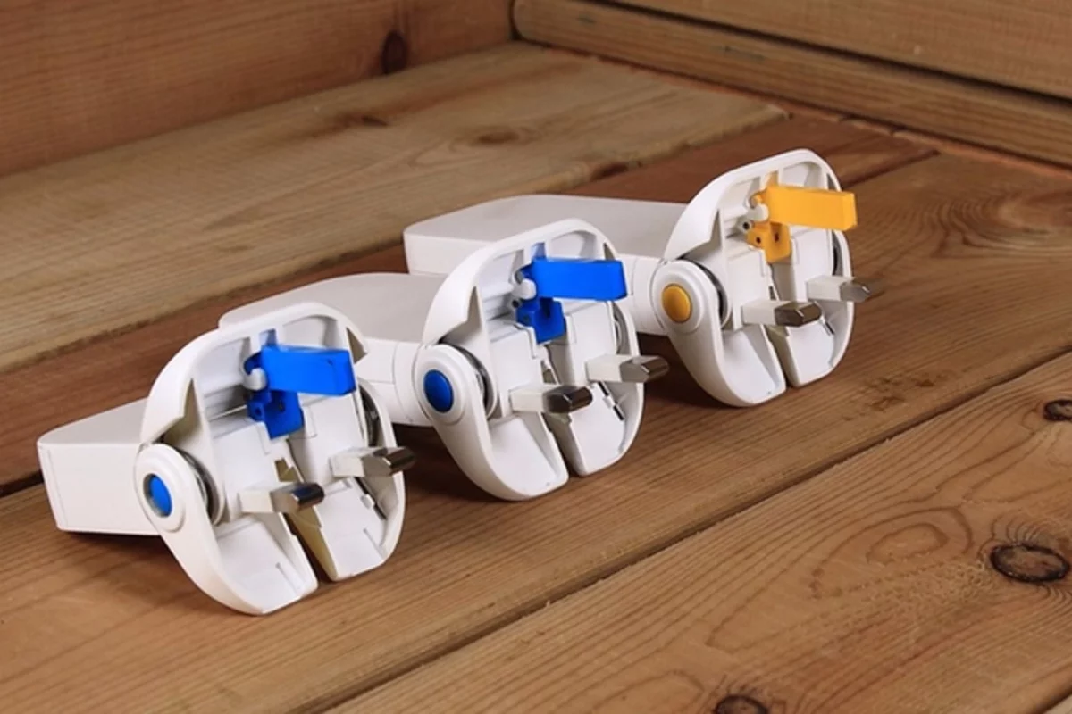 The Flip plug opens like a pair of jaws to reveal the prongs