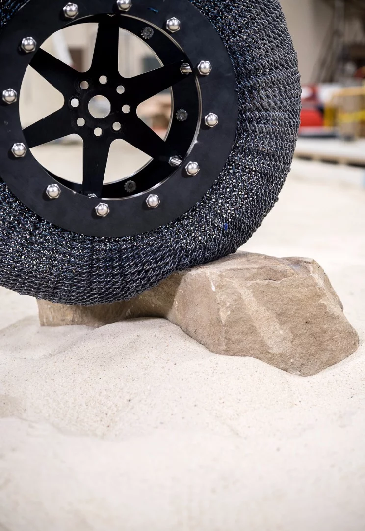 The new tire weighs about 20 lbs and can handle 165 lbs of load