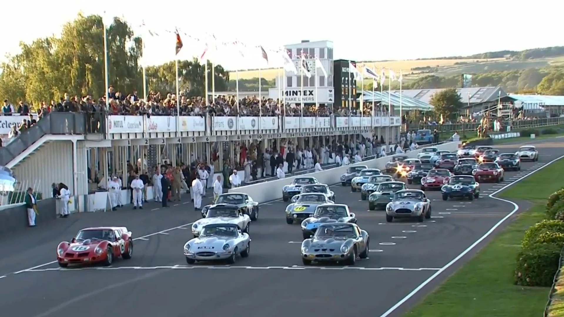 The Kinrara Trophy race at Goodwood Revival gets underway. Conservatively valued at a quarter of a billion dollars, the field included a Ferrari 250 GTO, and even rarer Ferrari 330 GTO, nine Ferrari 250 GT SWBs, four Aston Martin DB4 GTs, a pair of Austin Healey 3000s, two AC Cobras, and eight Jaguar E-types.