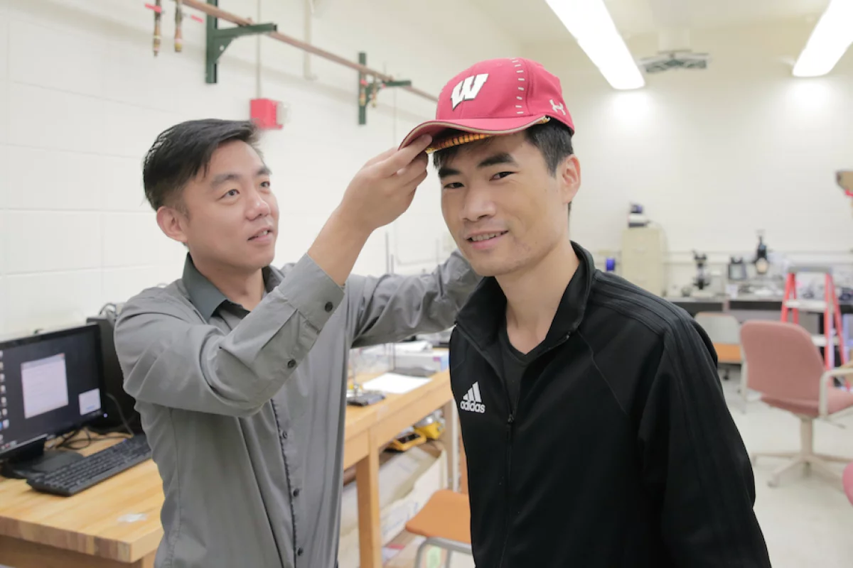 The hair-growth stimulating device is still being tested and in its prototype phase but the researchers demonstrate it is small enough to easily fit under a baseball cap