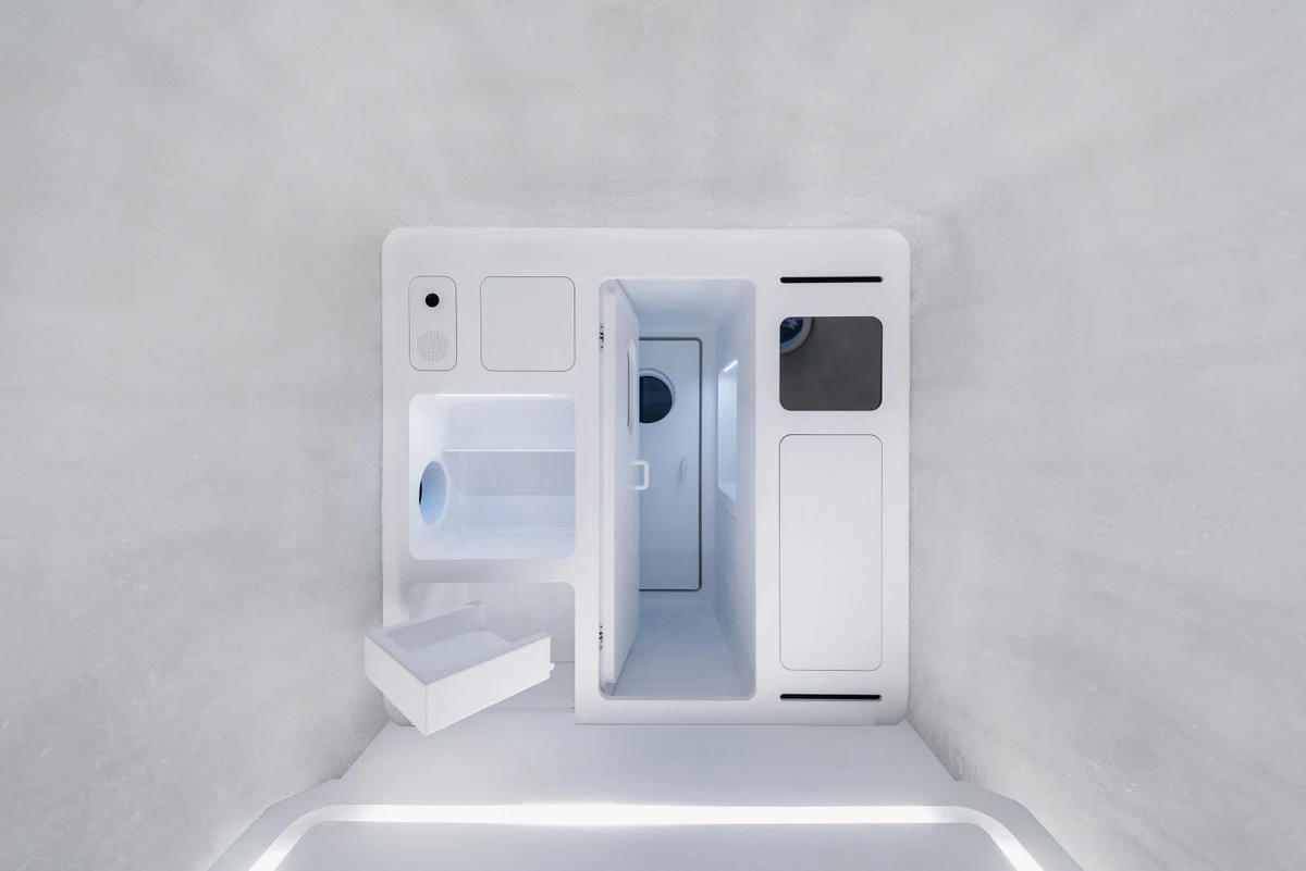 The Mars Case shelter's interior includes storage and seating
